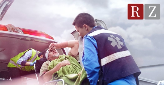accident victim being loaded into an ambulance